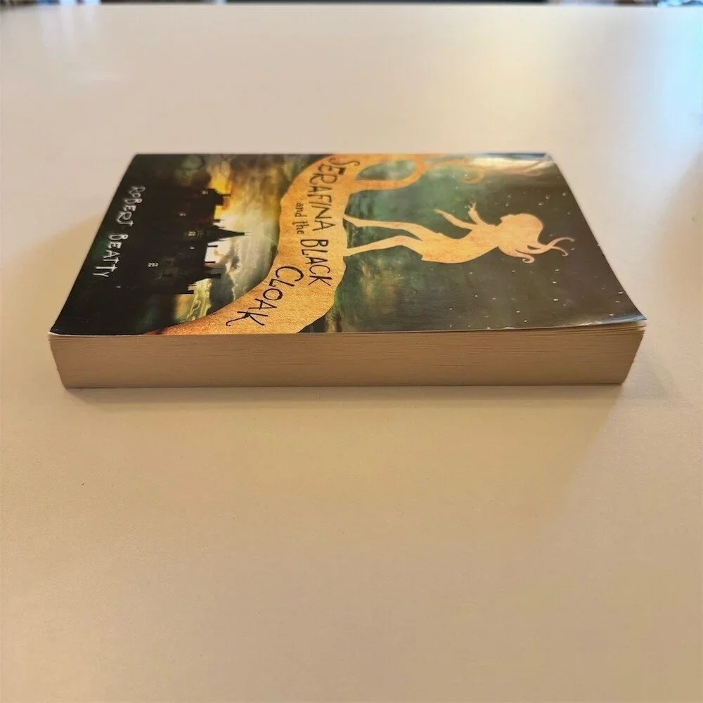 Serafina and the Black Cloak Paperback Book by Robert Beatty Scholastic